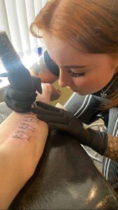 Female breast Tattoo artist