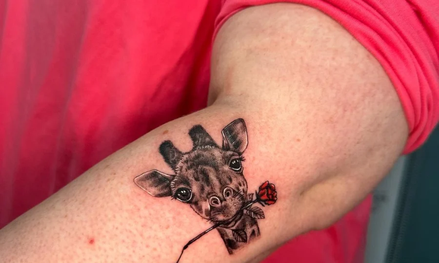 Blackwork floral wrist tattoo