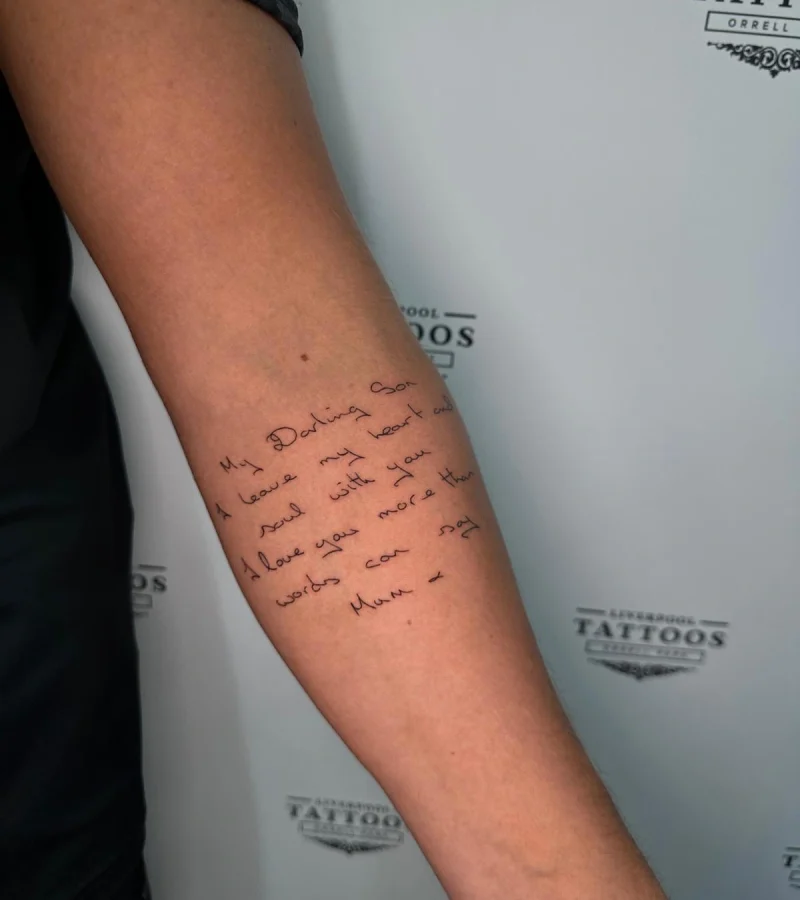 Minimalist fine line lettering tattoo