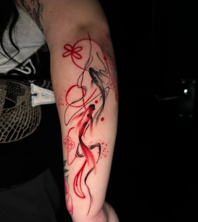 Red ink dragon forearm tattoo