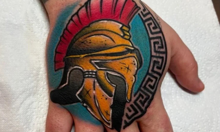 Vibrant hand tattoo in Danny's portfolio