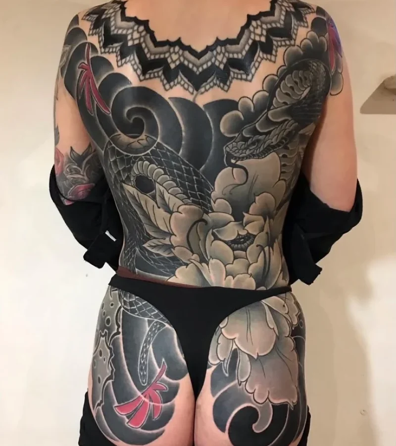 Large full back tattoo piece by Danny