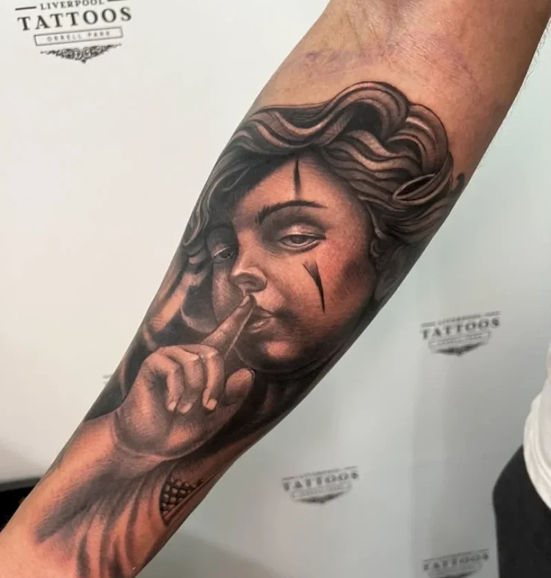 llustrative arm tattoo work by Danny