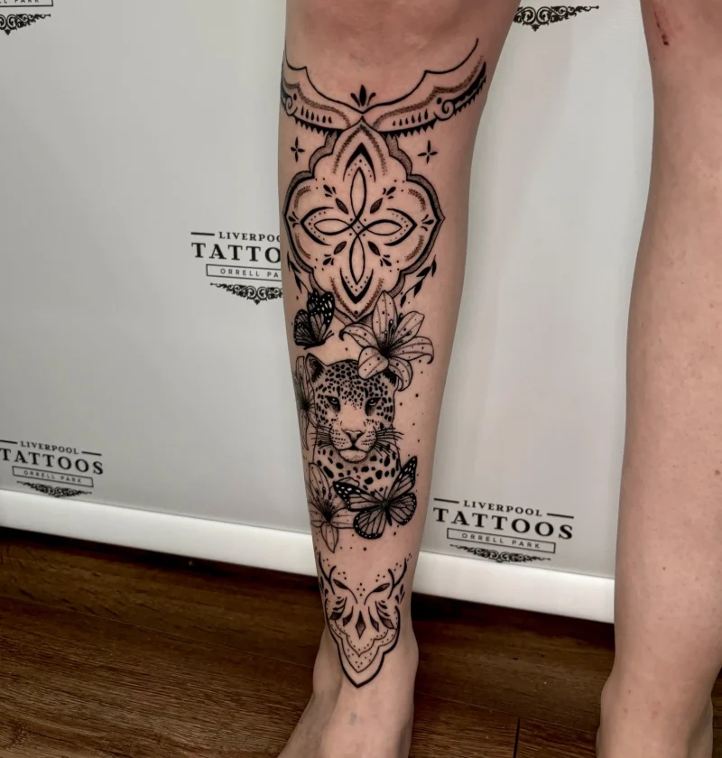 Intricate blackwork ornamental mandala forearm tattoo by Demi